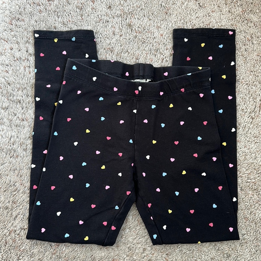 GIRLS H&M black leggings with hearts size 9-10Y